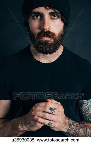 Portrait of hipster with knitted hat View Large Photo Image Stock Photography - Portrait of hipster with knitted hat. Fotosearch