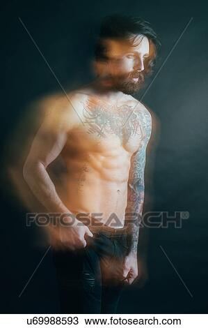Stock Image - Portrait of hipster with tattoos. Fotosearch