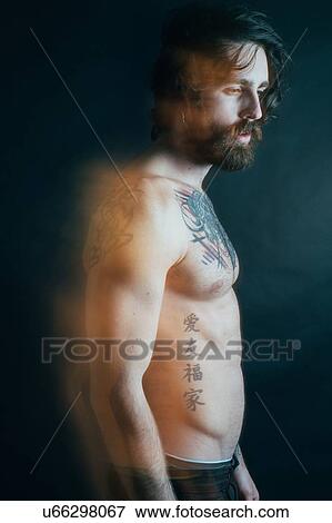 Portrait of hipster with tattoos View Large Photo Image Stock Photo - Portrait of hipster with tattoos. Fotosearch