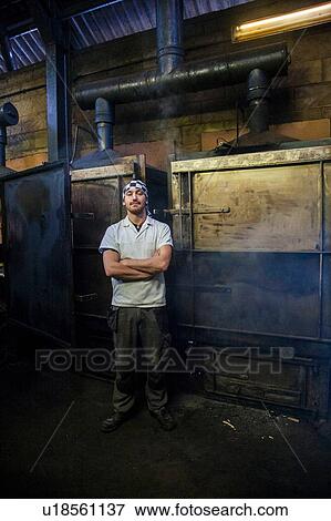 Portrait of smoker in smokehouse View Large Photo Image Stock Photo - Portrait of smoker in smokehouse. Fotosearch