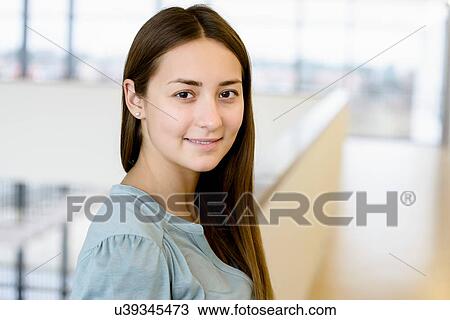 Portrait of woman in corridor View Large Photo Image Stock Image - Portrait of woman in corridor. Fotosearch
