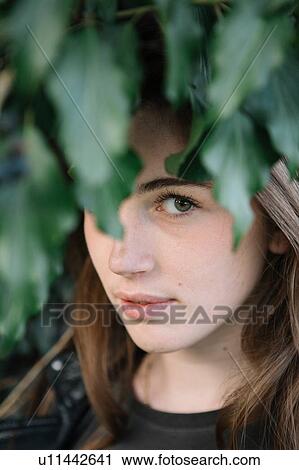 Stock Image - Portrait of young woman. Fotosearch