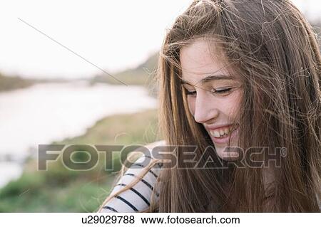 Stock Photo - Portrait of young woman. Fotosearch
