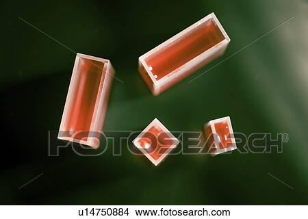 Picture - Quartz cuvettes containing red liquid.. Fotosearch