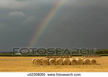 Rainbow and hay bales on field, Kiskunsagi National Park, Hungary View Large Photo Image Stock Photography - Rainbow and hay bales on field, Kiskunsagi National Park, Hungary. Fotosearch