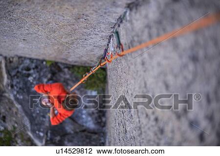Stock Image - Rock climber. Fotosearch