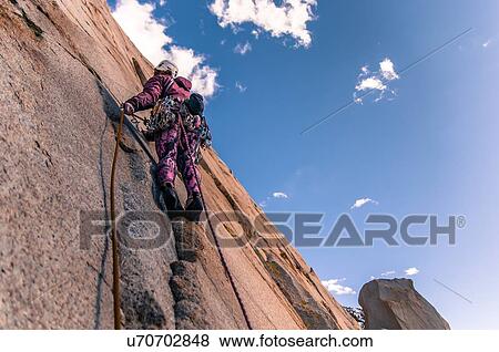 Rock climbing, Cardinal Pinnacle, Bishop, California, USA View Large Photo Image Stock Photo - Rock climbing, Cardinal Pinnacle, Bishop, California, USA. Fotosearch
