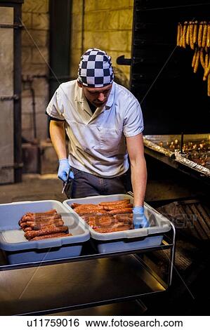 Stock Photograph - Sausages being smoked. Fotosearch