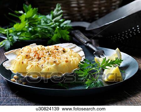 Stock Photo - Seafood scallop starter. Fotosearch