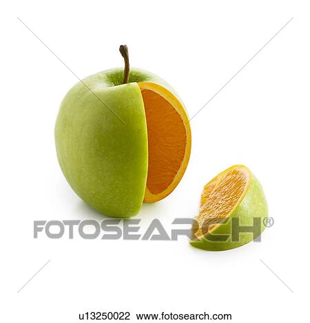Stock Image - Segment cut from apple showing orange inside.. Fotosearch