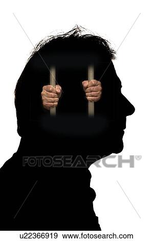 Silhouette of man's head with person trapped behind bars, illustration. View Large Photo Image Stock Photo - Silhouette of man's head with person trapped behind bars, illustration.. Fotosearch