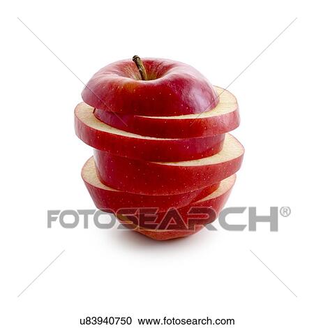 Stock Image - Sliced red apple against white background.. Fotosearch