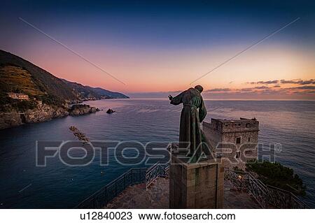 Stock Image - Statue of Saint Francis of Assisi, Monterosso al Mare, Cinque Terre, Liguria, Italy. Fotosearch