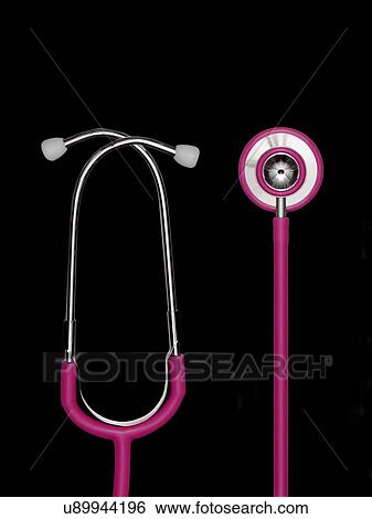 Stock Photograph - Stethoscope against a black background.. Fotosearch