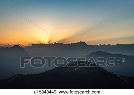 Stock Photo - Sunset over French Alps, Parc naturel rgional du Massif des Bauges, Chatelard-en-Bauges, Rhone-Alpes, France. Fotosearch
