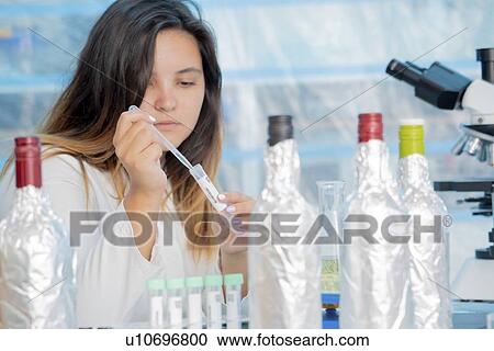 Testing wine in quality control lab. View Large Photo Image Stock Image - Testing wine in quality control lab.. Fotosearch