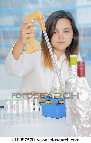 Testing wine in quality control lab. View Large Photo Image Stock Image - Testing wine in quality control lab.. Fotosearch