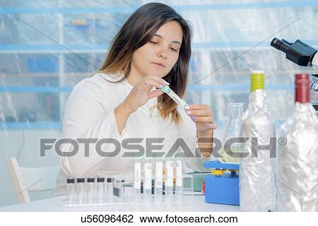 Testing wine in quality control lab. View Large Photo Image Stock Image - Testing wine in quality control lab.. Fotosearch