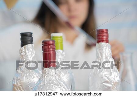 Testing wine in quality control lab. View Large Photo Image Stock Photo - Testing wine in quality control lab.. Fotosearch