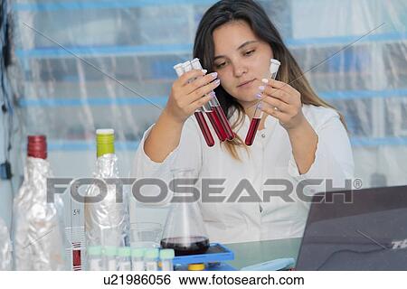 Testing wine in quality control lab. View Large Photo Image Stock Photograph - Testing wine in quality control lab.. Fotosearch