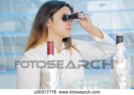 Testing wine in quality control lab. View Large Photo Image Stock Photograph - Testing wine in quality control lab.. Fotosearch