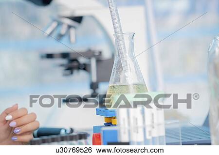 Testing wine in quality control lab. View Large Photo Image Stock Photograph - Testing wine in quality control lab.. Fotosearch
