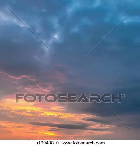 Thick clouds obscuring sun View Large Photo Image Stock Image - Thick clouds obscuring sun. Fotosearch