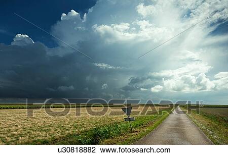 Thunderstorms travelling over Rilland, Zeeland, Netherlands View Large Photo Image Stock Image - Thunderstorms travelling over Rilland, Zeeland, Netherlands. Fotosearch