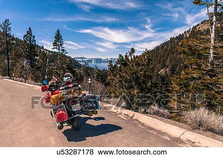 Stock Photo - Touring bike by roadside, enroute between Reno and Lake Tahoe, Nevada, USA. Fotosearch