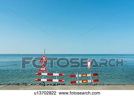 Traffic signs along shoreline View Large Photo Image Stock Image - Traffic signs along shoreline. Fotosearch