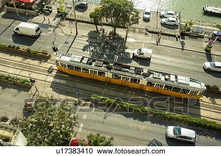 Stock Image - Tram and traffic by River Danube, Budapest, Hungary. Fotosearch