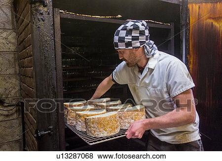 Tray of cheese going into smoker View Large Photo Image Stock Photo - Tray of cheese going into smoker. Fotosearch