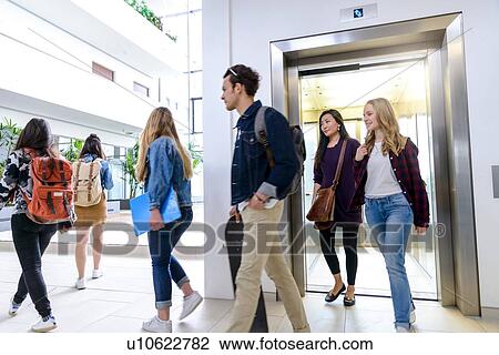 University students exiting elevator in campus View Large Photo Image Stock Image - University students exiting elevator in campus. Fotosearch