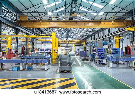 Stock Photo - View of engineering factory making gearboxes. Fotosearch