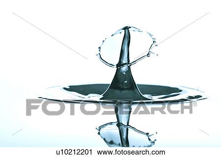 Stock Image - Water drop impact.. Fotosearch