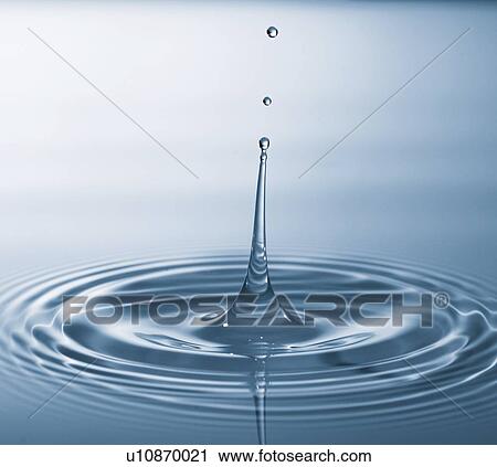 Stock Image - Water drop impact.. Fotosearch