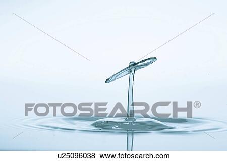 Stock Photo - Water drop impact.. Fotosearch