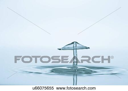 Water drop impact. View Large Photo Image Stock Photography - Water drop impact.. Fotosearch