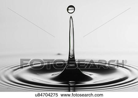 Stock Photography - Water drop impact.. Fotosearch