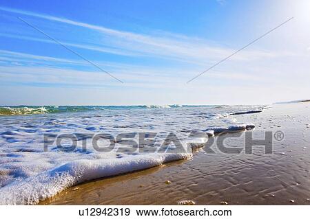 Waves breaking on beach. View Large Photo Image Stock Photo - Waves breaking on beach.. Fotosearch