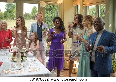 Wedding guests at reception View Large Photo Image Stock Image - Wedding guests at reception. Fotosearch