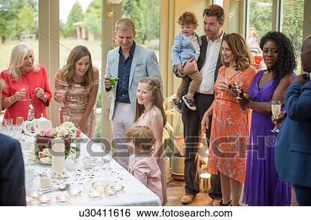 Stock Photograph - Wedding guests at reception. Fotosearch