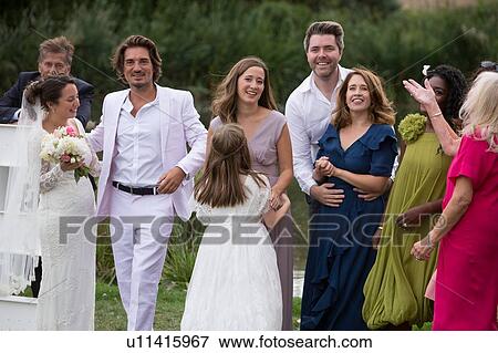 Wedding guests with newlyweds View Large Photo Image Stock Photo - Wedding guests with newlyweds. Fotosearch