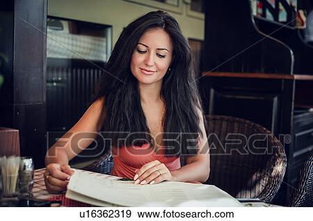 Woman at cafe View Large Photo Image Stock Photo - Woman at cafe. Fotosearch