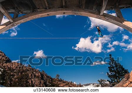 Woman highlining, Donner Pass, Truckee, California, USA View Large Photo Image Stock Photo - Woman highlining, Donner Pass, Truckee, California, USA. Fotosearch
