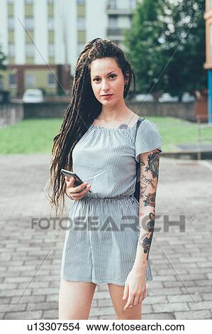 Picture - Woman in park. Fotosearch