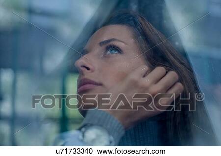 Woman looking reflective on morning commute, Budapest, Hungary View Large Photo Image Stock Image - Woman looking reflective on morning commute, Budapest, Hungary. Fotosearch