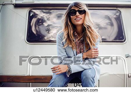 Woman posing near trailer View Large Photo Image Stock Image - Woman posing near trailer. Fotosearch