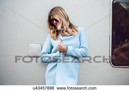 Woman posing near trailer View Large Photo Image Stock Photo - Woman posing near trailer. Fotosearch