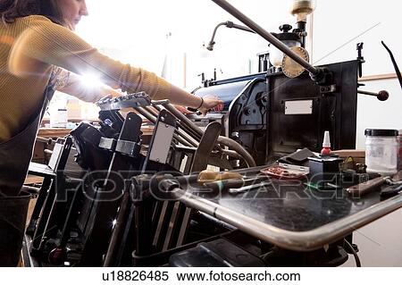 Woman preparing printer in shop View Large Photo Image Stock Photography - Woman preparing printer in shop. Fotosearch
